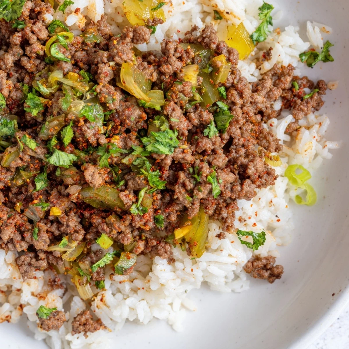 Serving suggestion for Cajun Dirty Rice with Ground Beef, a colorful and aromatic main dish perfect for weeknight meals or festive gatherings.