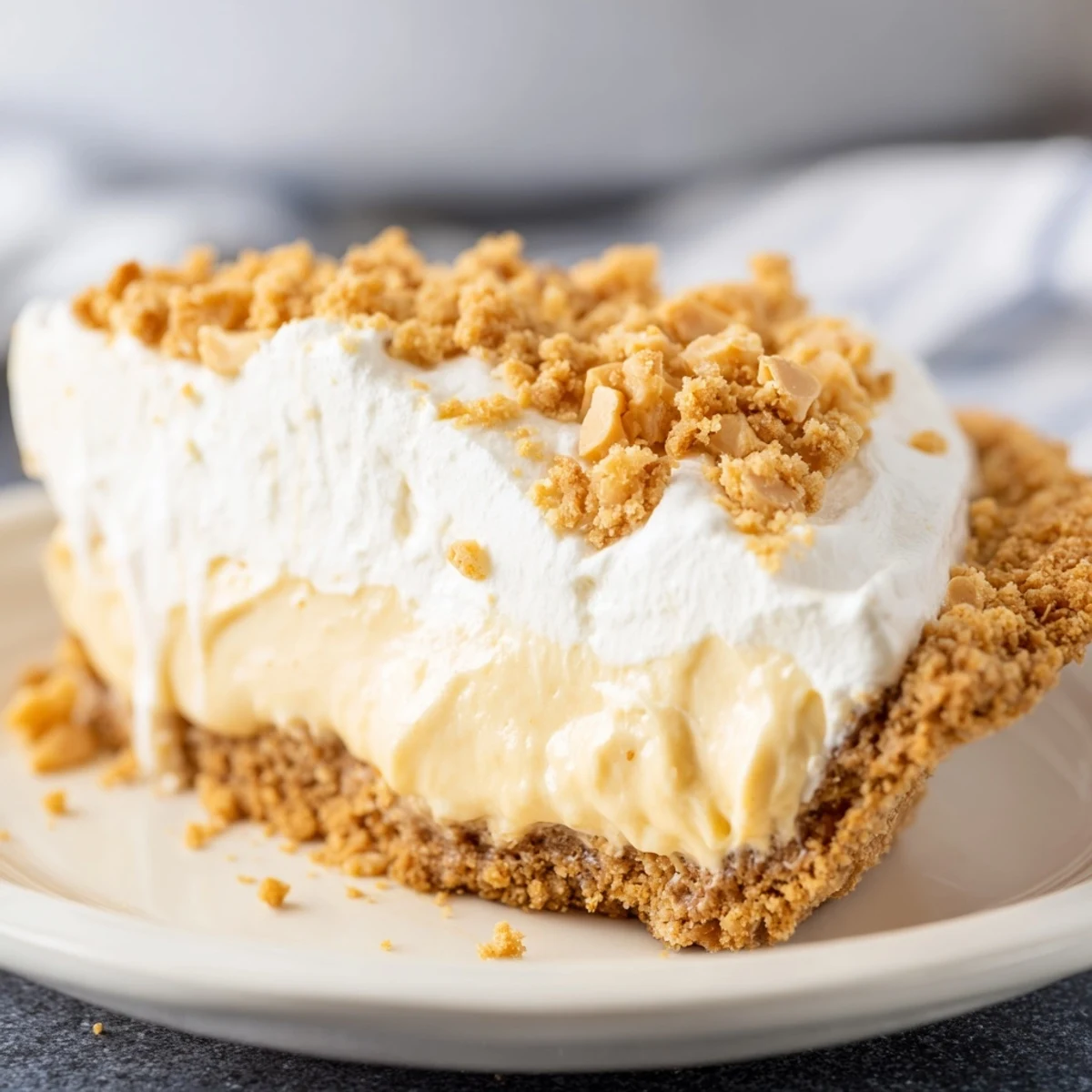 Velvety Amish Peanut Butter Dream Pie slice showing luscious custard filling in flaky golden crust
