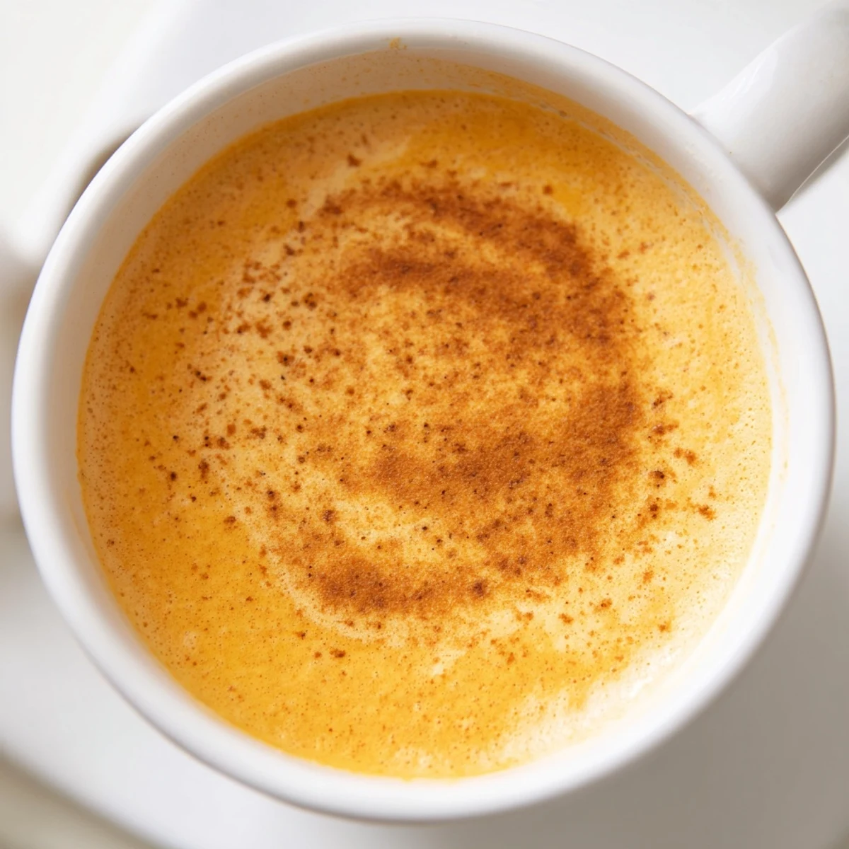 Frothy goguma latte swirled with roasted sweet potato and warm spices