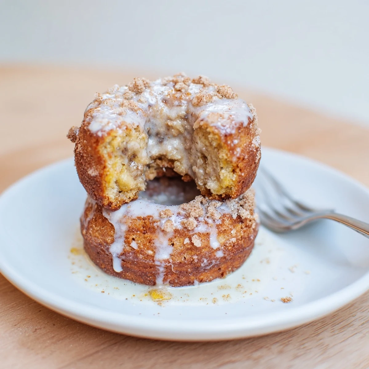 Moist Banana Donuts arranged on a plate, perfect for cozy breakfast  