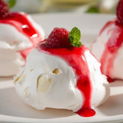 Pavlova Bombs With Raspberry Coulis